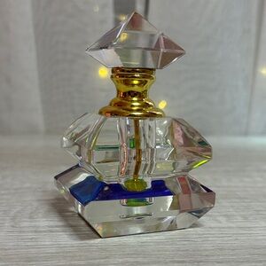 Elegant Crystal Perfume Bottle with Gold Accents